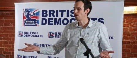 Le Pen’s UK rep and the man who believed synagogue bombing was “well intentioned”