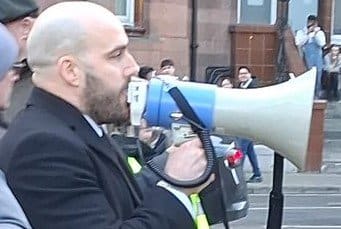 UKIP leader Nick Tenconi bellows through his megaphone at anti-fascist counter-demonstrators