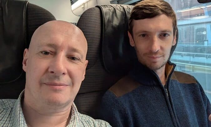 Kenny Smith Steve Laws on train to Paris