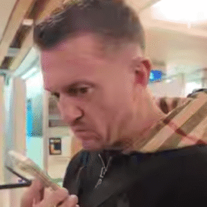 Tommy Robinson being told he has to pay £103,000